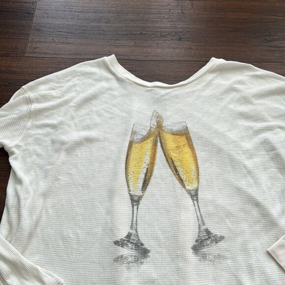 WildFox Pee Loved Long Sleeve Oversized Top with Champagne glasses graphic. - Picture 2 of 6